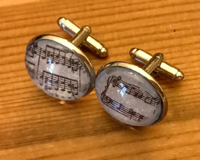 Cufflinks, featuring printed music