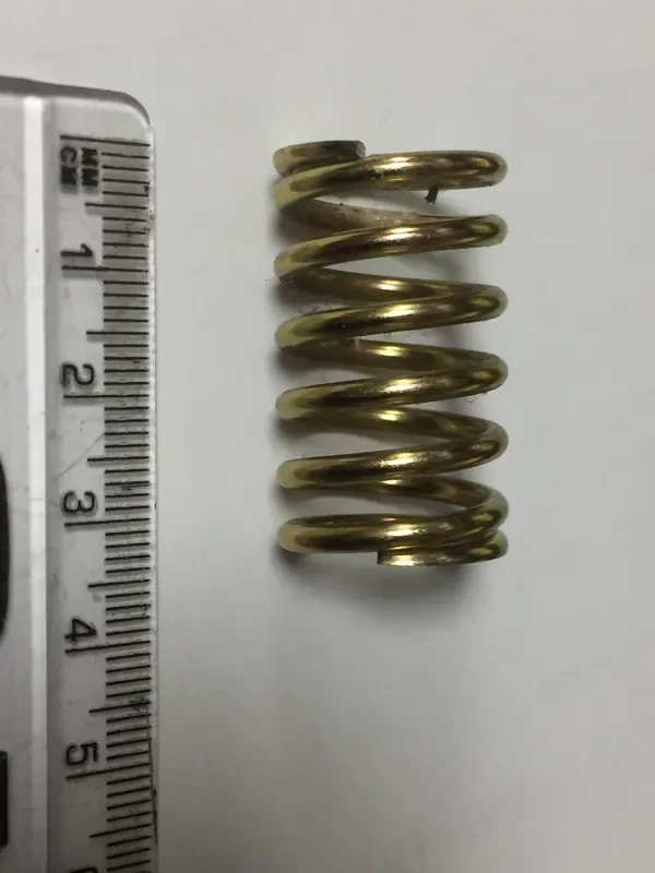 VP348101 Clavinova pedal spring – brass colour